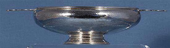 A George V Arts & Crafts silver bowl, by Albert Edward Jones, Diameter to handles 281mm, weight 9.8oz/305grms